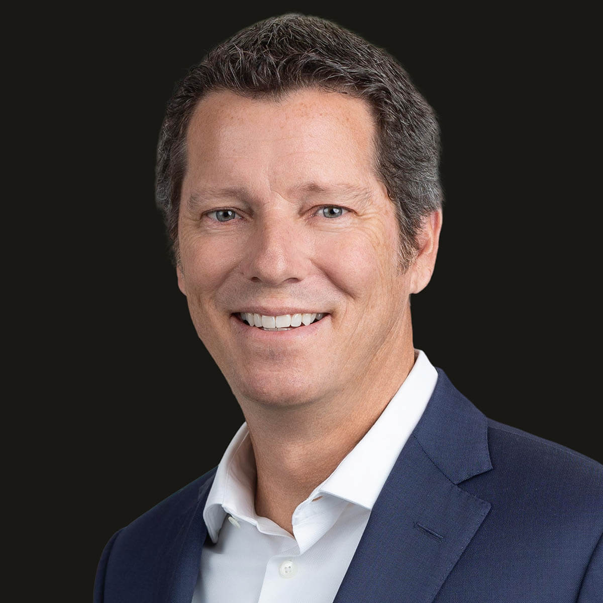 Portrait of David Simon, Managing Director and Co-Founder of SRS Capital Advisors